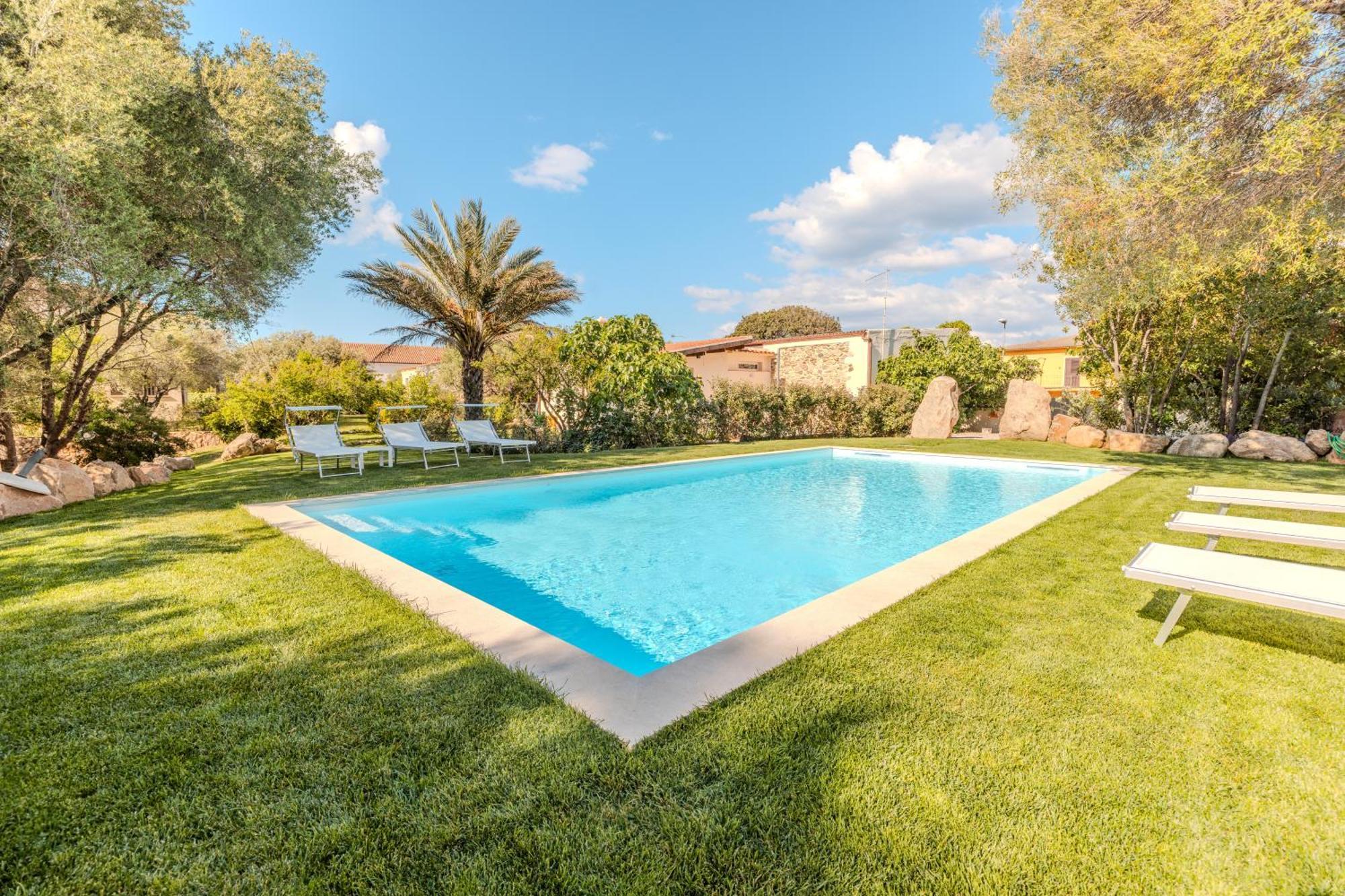Stazzo San Teodoro Piscina Condivisaアパートメント エクステリア 写真