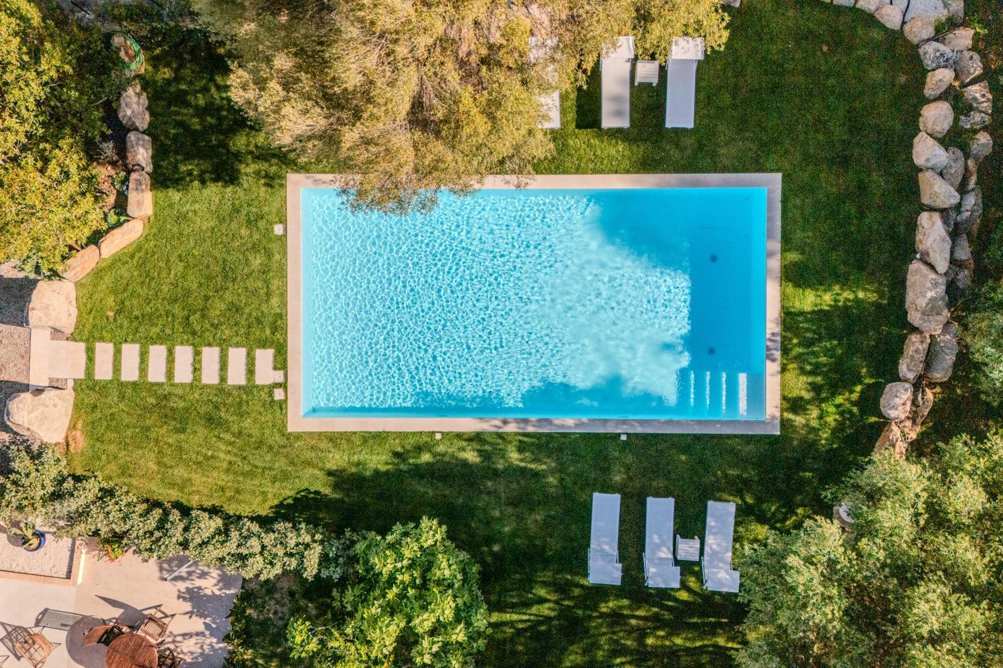 Stazzo San Teodoro Piscina Condivisaアパートメント エクステリア 写真