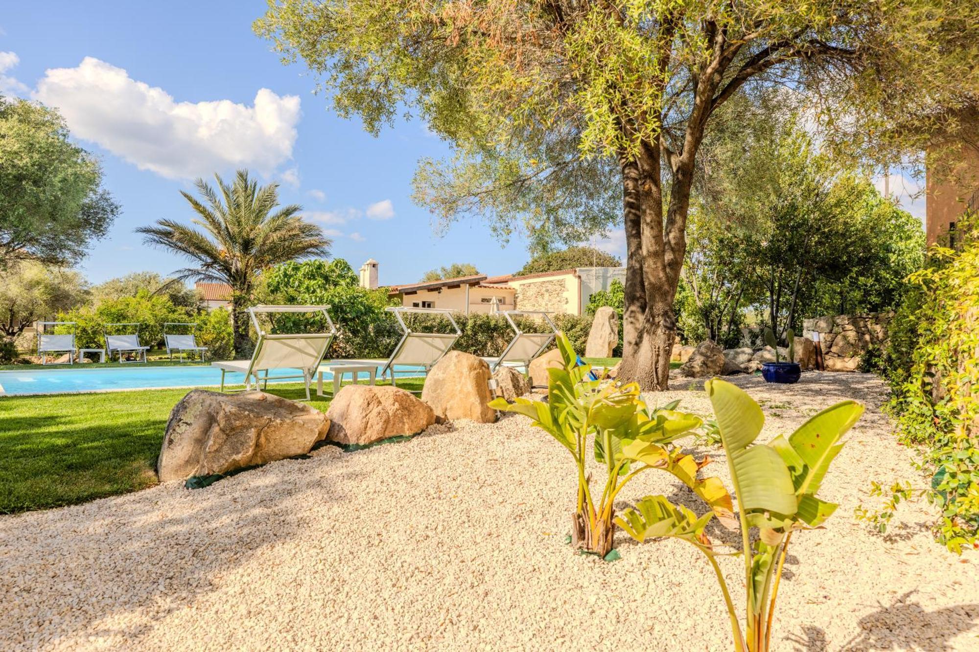 Stazzo San Teodoro Piscina Condivisaアパートメント エクステリア 写真