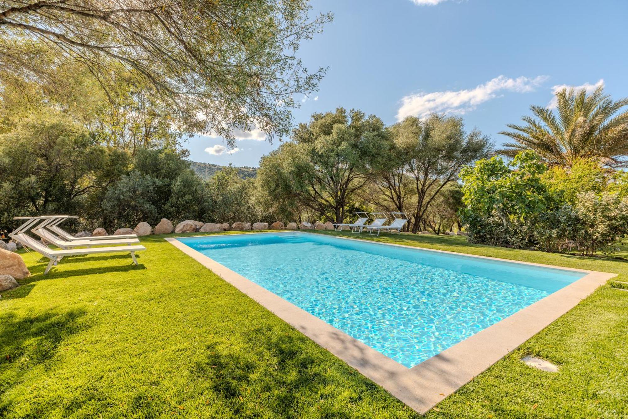 Stazzo San Teodoro Piscina Condivisaアパートメント エクステリア 写真